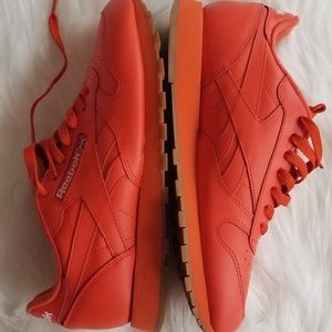 Reebok orange sneakers